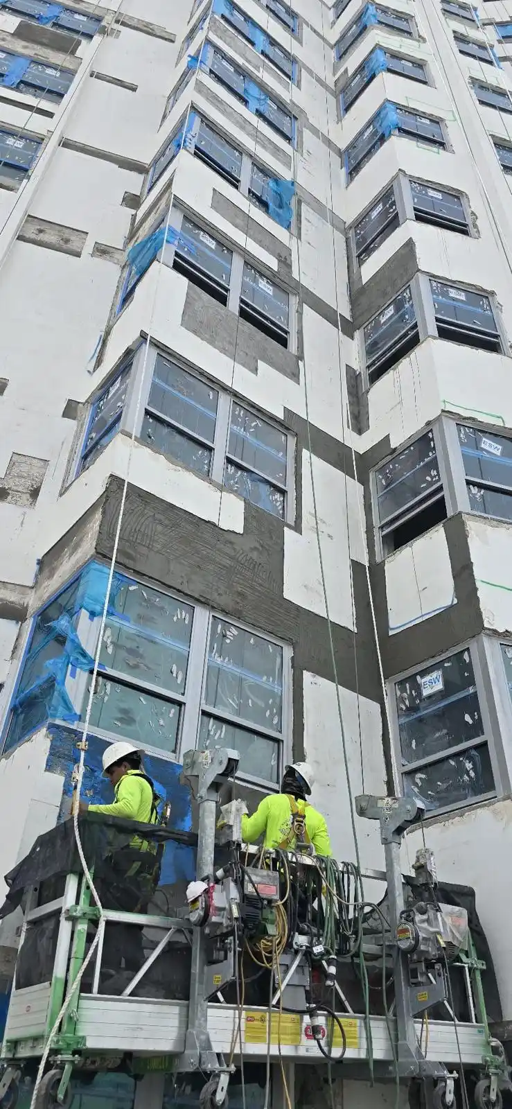 Facade concrete repairs around window openings at the Delano Hotel in Miami Beach, Florida