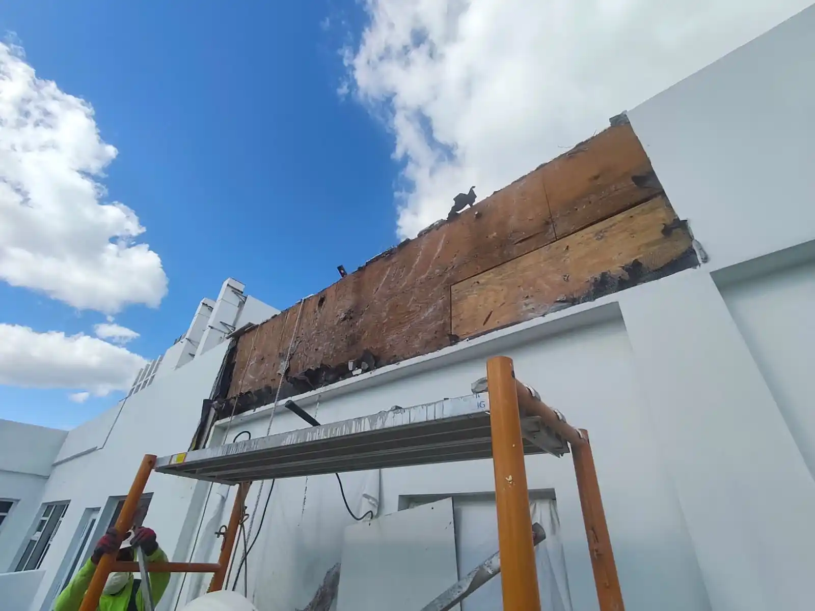 Removal of damaged exterior facade